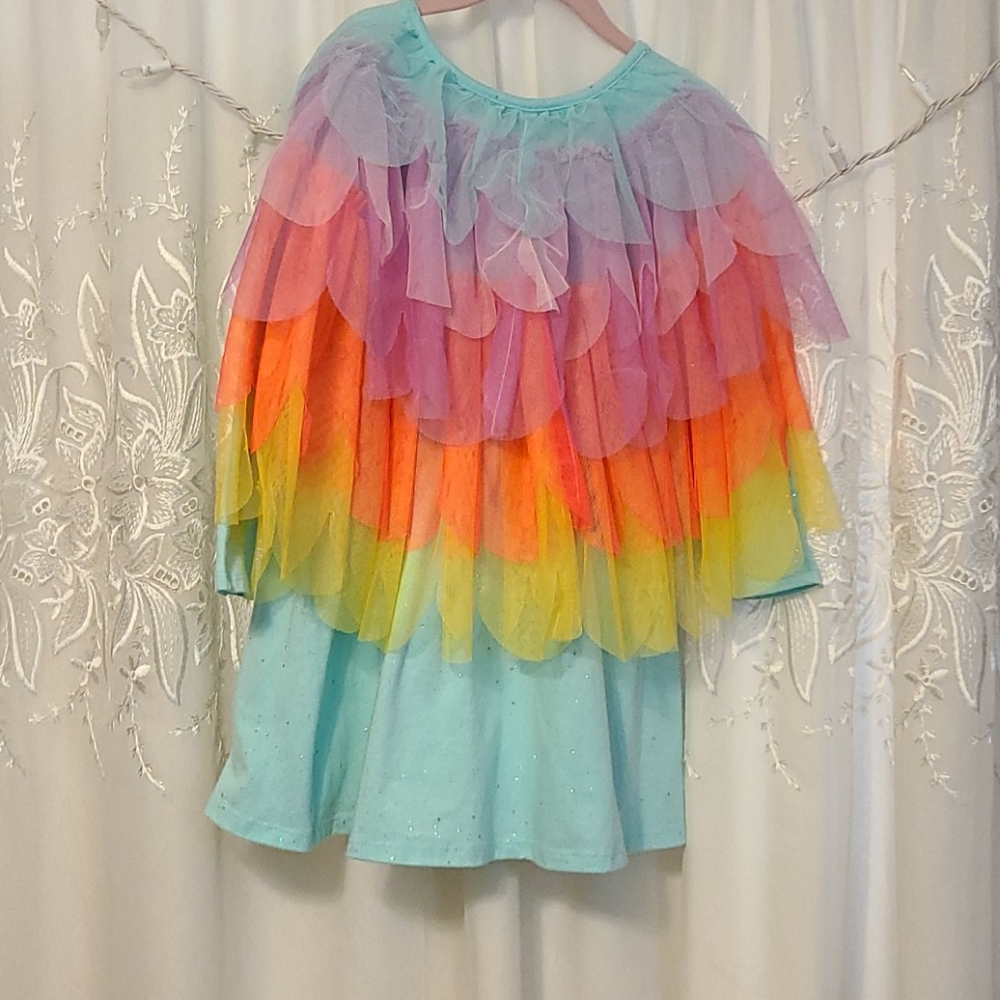 Bright coloured winged dress